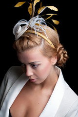 Young model with bridal hairstyle, isolated on black