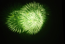 Green Fireworks On A Dark Night