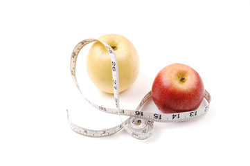 Apple and measuring tape.