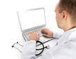 © spaxiax - Rear view of a young doctor with laptop