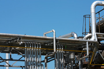 Wall Mural - many steel pipes in oil refinery