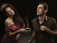 Sexy Couple With Cup Of Coffee