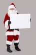 © nyul - Santa holding blank white board
