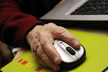 Senior working on computer