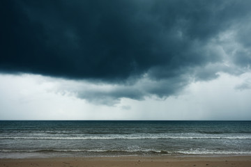 Wall Mural - Stormy rain clouds over sea