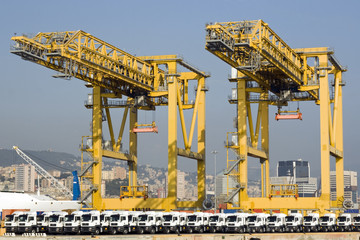 Harbor cranes and new trucks - Genoa, Italy