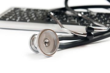 Stethoscope and keyboard illustrating concept of digital securit