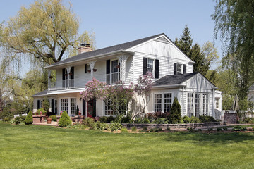 Wall Mural - White home with second floor balcony