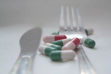 pills and cutlery