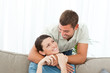 © WavebreakMediaMicro - Portrait of an adorable couple together in the living room