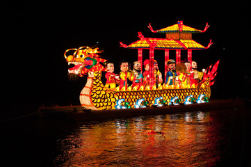 Sticker - Night shot of dragon boat with lamp in river