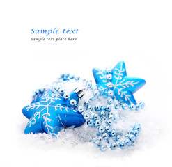 blue christmas decoration baubles on white