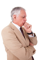 Portrait of a handsome mature businessman, thinking