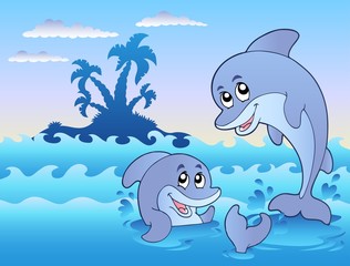 Sticker - two dolphins playing in waves