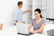 © WavebreakMediaMicro - Cute woman working on the laptop in the kitchen