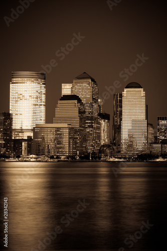 Plakat na papierze fotorealistycznym Manhattan finansowej dzielnicy o zachodzie słońca z jersey