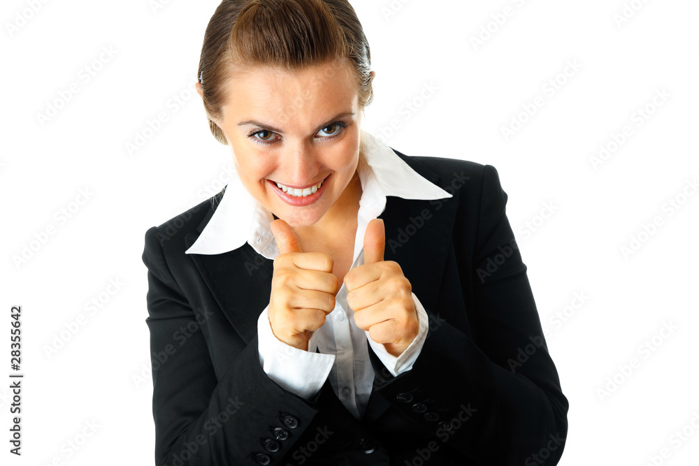 Smiling modern business woman showing thumbs up gesture Stock Photo ...