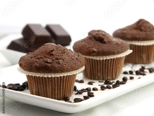 Fototapeta na wymiar Fresh baked chocolate muffins