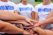 © mangostock - volunteer group hands together
