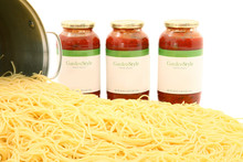 Pot Of Spaghetti Noodles And Sauce Jars