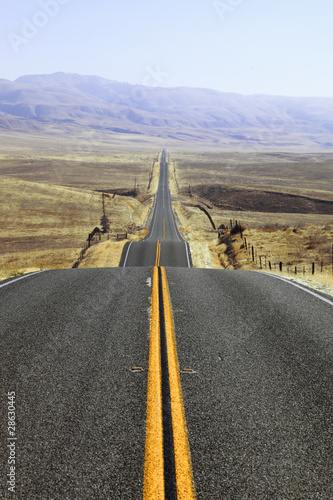 Fototapeta na wymiar Abrupt bends of road on the Californian steppes