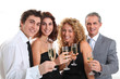 © goodluz - Group of friends cheering with glasses of champagne