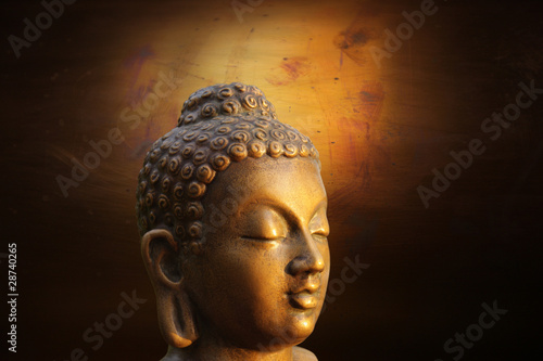 Board z aluminiowym obramowaniem Głowa budha na złotym tle