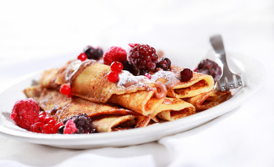 Crepes filled with chocolate and berries