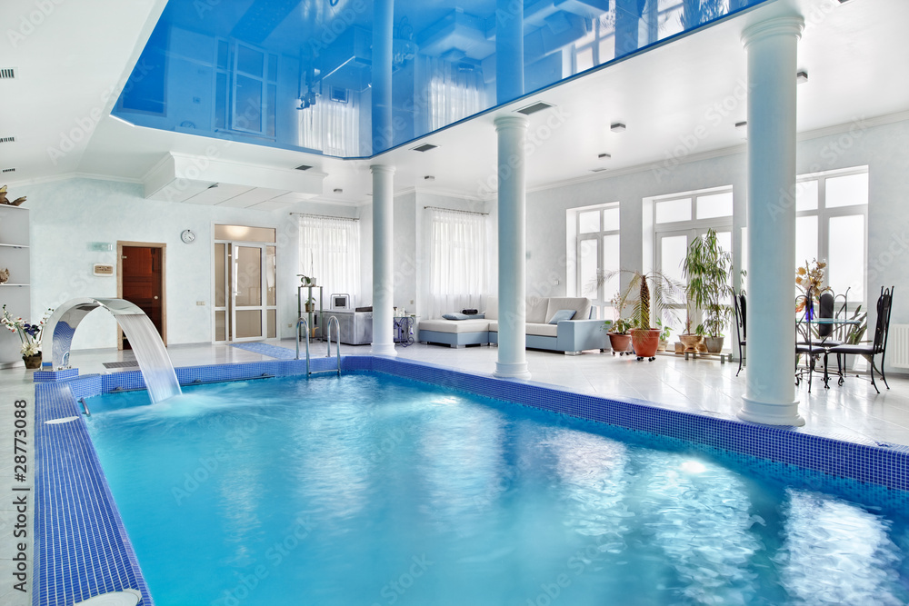 Indoor big blue swimming pool interior in modern minimalism styl Stock ...