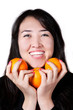Kazakh Girl with tree oranges