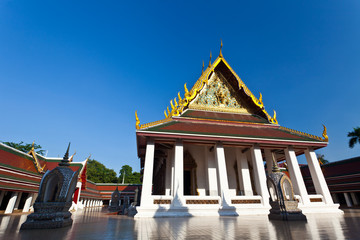 Wall Mural - Front temple roof against blue sky