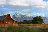 Fototapeta Góry - Sunrise on the Tetons Mountain range with the Mormon barn