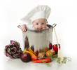 © blessings - Licking baby sitting in a chef's pot