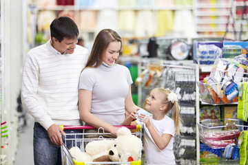 Happy family in the store