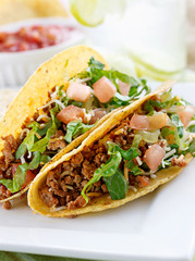 Wall Mural - Beef tacos with lettuce cheese and tomato