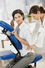 Poster - Businesswoman talking on phone during massage