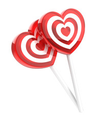 Two lollipops heart shaped isolated on white