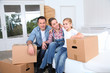 © goodluz - Happy family moving in new house