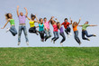 © godfer - group of happy kids or teens jumping