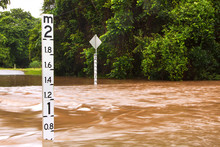 Flooded Road With Depth Indicators In Queensland, Australia