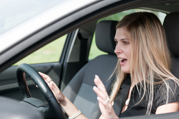 Wall Mural - Before accident - young woman driving car