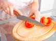 © LanaK - cutting tomatoes