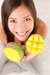 Wall Mural - Mango fruit woman happy