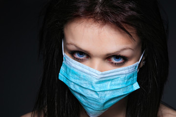 Young nurse in mask