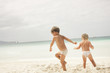© Alena Yakusheva - two children running on beach