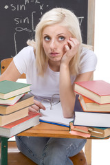 Caucasian college student woman studying math exam
