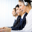 © vgstudio - Three support phone operators at workplace