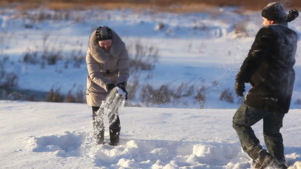 Wall Mural - Young couple outdoors winter fun