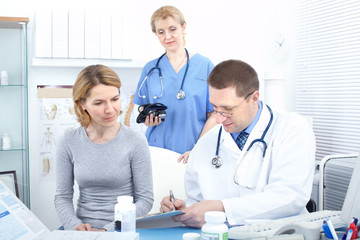 Canvas Print - doctors and woman patient