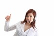 © Knut Wiarda - young woman with headset and thumb up (white background)